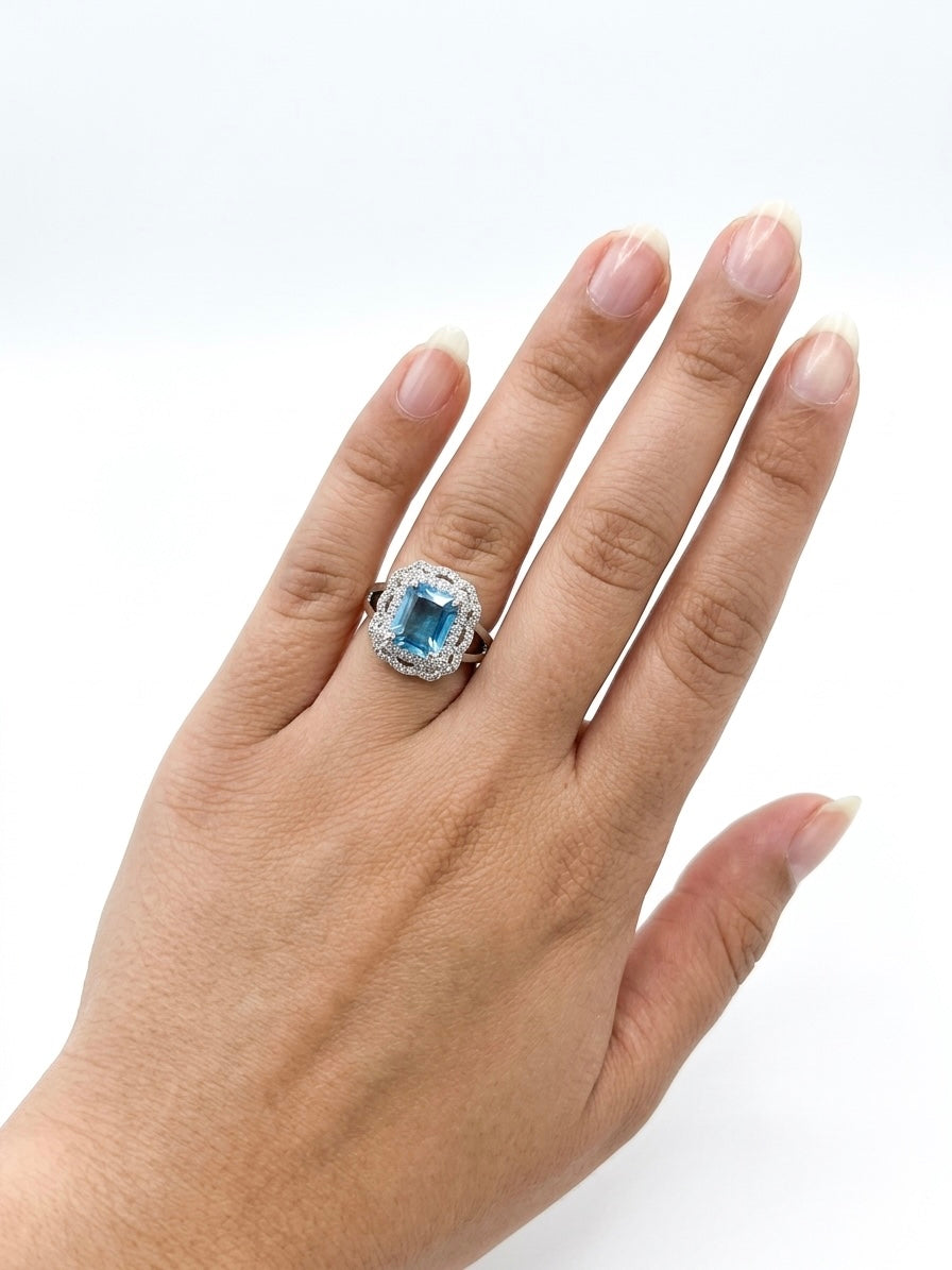 Silver-plated ring with stones.