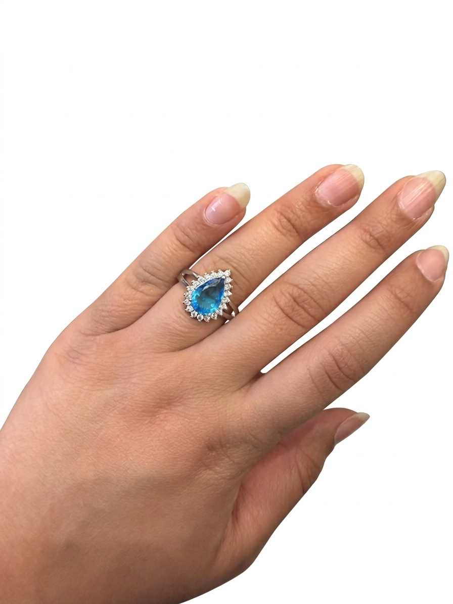 Silver-plated ring with stones.
