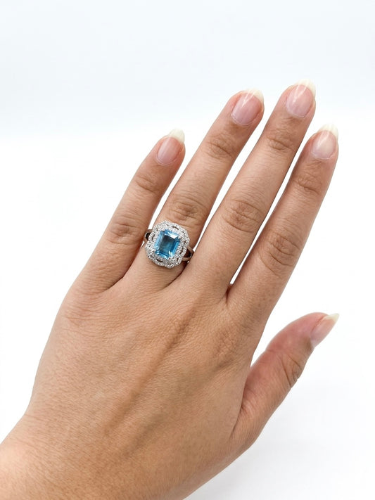 Silver-plated ring with stones.