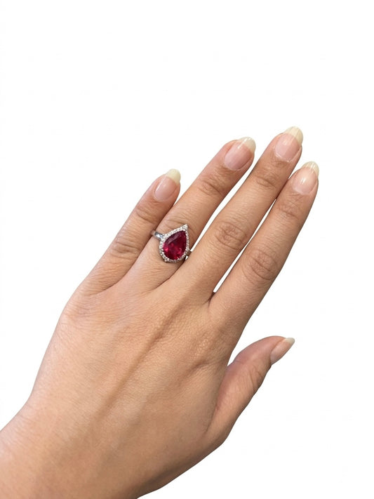 Silver-plated ring with stones.