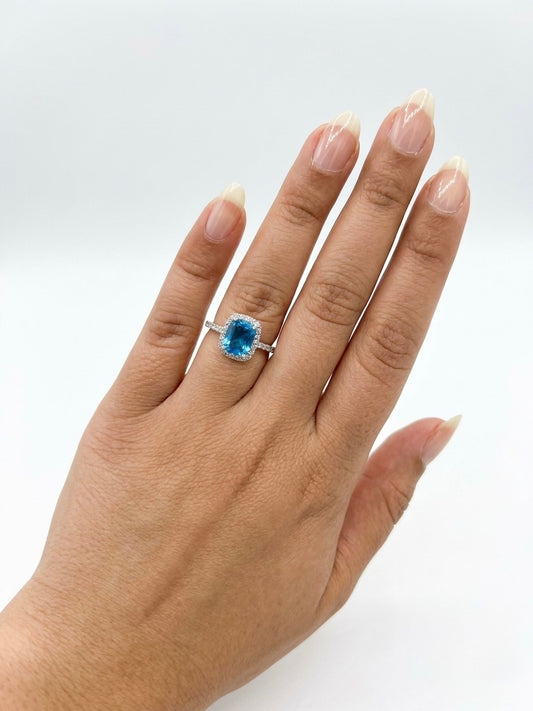 Silver-plated ring with stones.