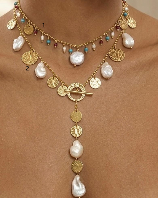 Pearl necklace with turquoise and ruby.
