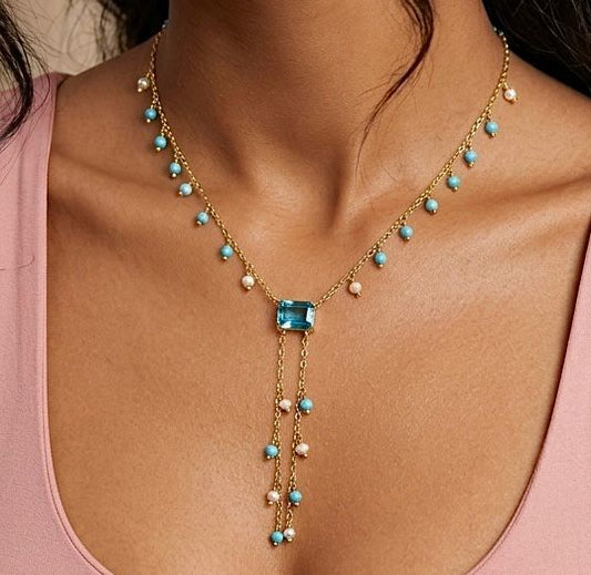 Silver necklace with blue topaz