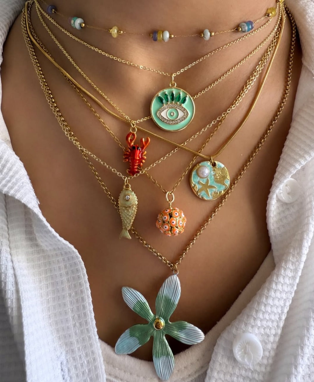 مجموعة قلادات مطلية بالذهب